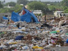 Hallan cadáver en descomposición en vertedero de Santiago