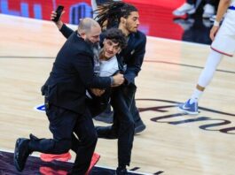 NBA arresta y veta de por vida a aficionado por irrumpir en cancha